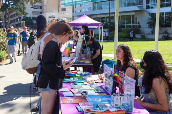 CAPS Tabling on campus, talking with students