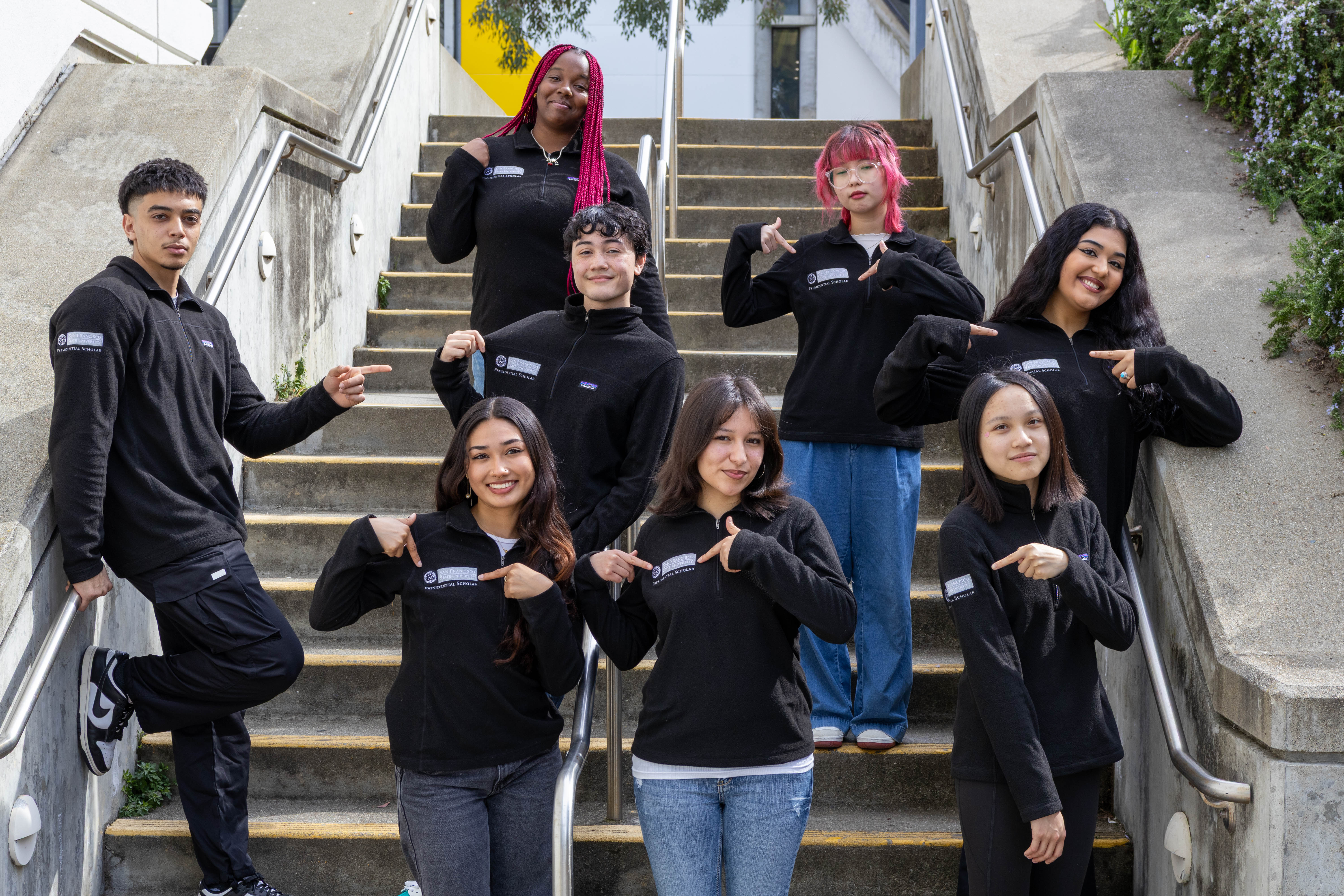 students standing on steps